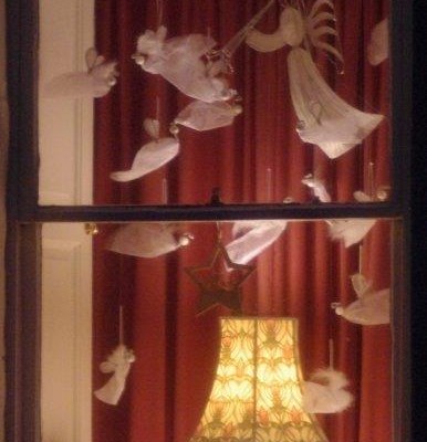 Angels fly in an advent window in Askrigg